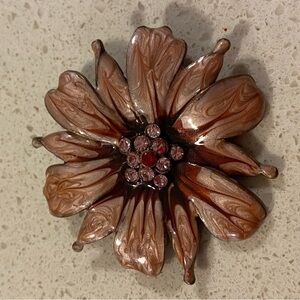 Stunning pink and maroon enamel brooch with pink & one red crystal. 2” diameter